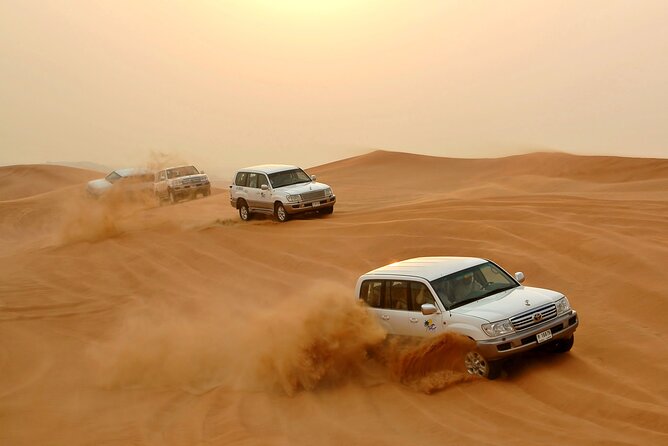 Desert Safari Experience with Dune Bashing and Dinner in Dubai - Sunset coffee, dates, and the camp welcome