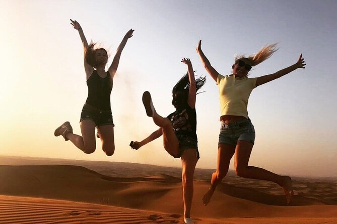 Desert Safari in 4x4 Car with BBQ Dinner and Belly Dance - Sandboarding and camel riding at camp