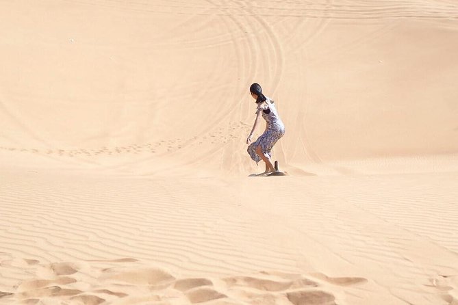 Desert Safari Morning with Camel Ride and Sand Boarding - A fast morning in the red dunes