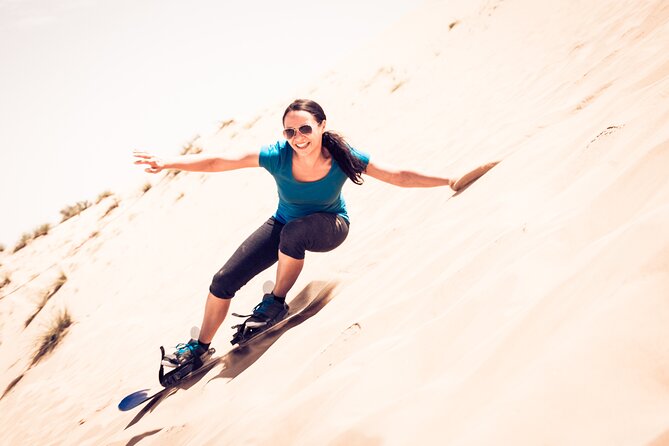 Desert Safari, Open Desert Quad Bike Experience with BBQ Dinner - Sandboarding and the short camel ride