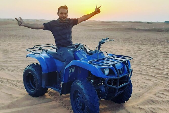 Desert Safari, Quad Biking, Sand Surfing and BBQ Dinner In Dubai - Sandboarding and the sunset pause