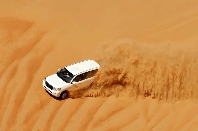 Desert Safari Redsand Dunes with BBQ Dinner in Dubai - Sunset is the calm center of the afternoon