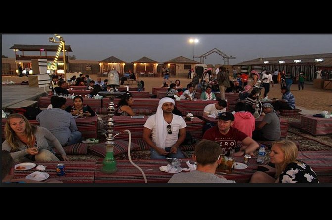 Desert Safari Tour, 6 Hour Fun, Family & Friends, Camel Ride & Dinner Included. - Barbecue dinner with four live shows