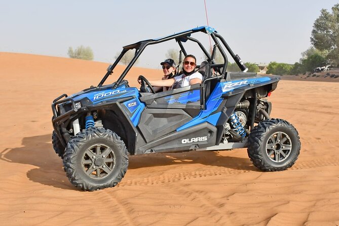 Desert Safari With 30 Mins Of Quad Bike Tour Camel Ride And BBQ - Sandboarding and a short camel ride