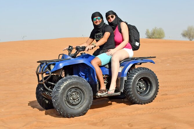 Desert Safari With 30 Mins Of Quad Bike Tour Camel Ride And BBQ - The Bedouin-style camp after sunset