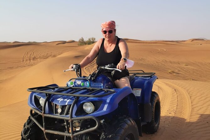 Desert Safari With 30 Mins Of Quad Bike Tour Camel Ride And BBQ - BBQ dinner and three live shows
