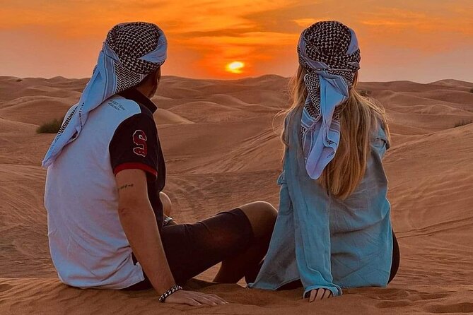 Desert Safari with BBQ Dinner, Camel Ride, Sand Board & Live Show - Dune bashing across the Lahbab sand