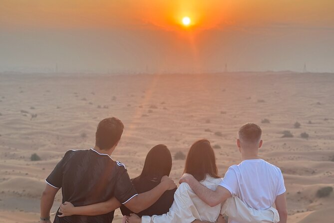 Desert Safari With BBQ Dinner, Quad Bike & Camel Ride from Dubai - Belly dancing, fire shows, and the evening program