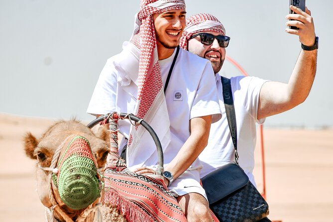 Desert Safari With BBQ Dinner, Quad Bike & Camel Ride from Dubai - Dune bashing across the red sand