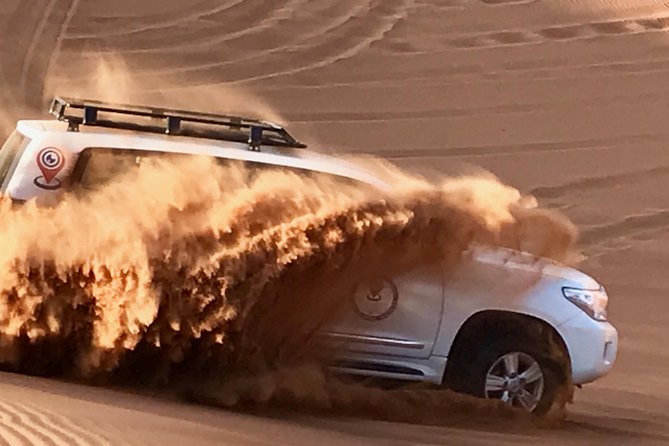 Desert Safari with BBQ Dinner - UAE Must Do - Sandboarding, camels, and a closer look at desert life