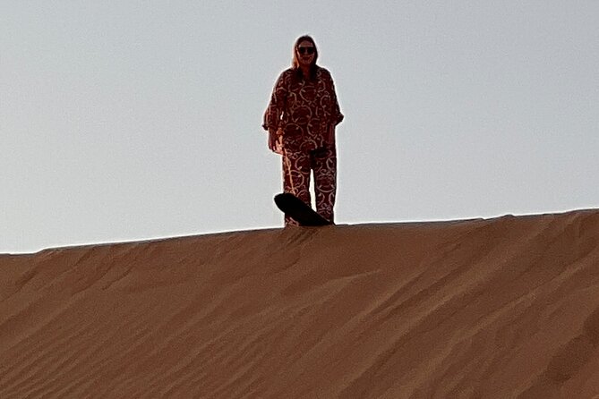 Desert Safari with Dune Bashing and Camel Ride plus Sand Boarding - The sunset stop is the calmest part