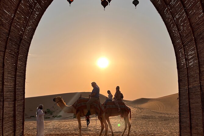 Desert Safari with Dune Bashing and Camel Ride plus Sand Boarding - Arabic coffee and dates set the tone at camp