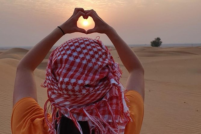 Desert Safari with Quad Bike, 4x4 Dune Bashing and Camel Ride - Barbecue dinner and evening entertainment