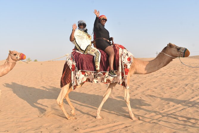 Dubai: 60Minute Self-Drive ATV Quadbike, Camel Ride, Sand Surfing - Camel Riding Adds a Slower Desert View