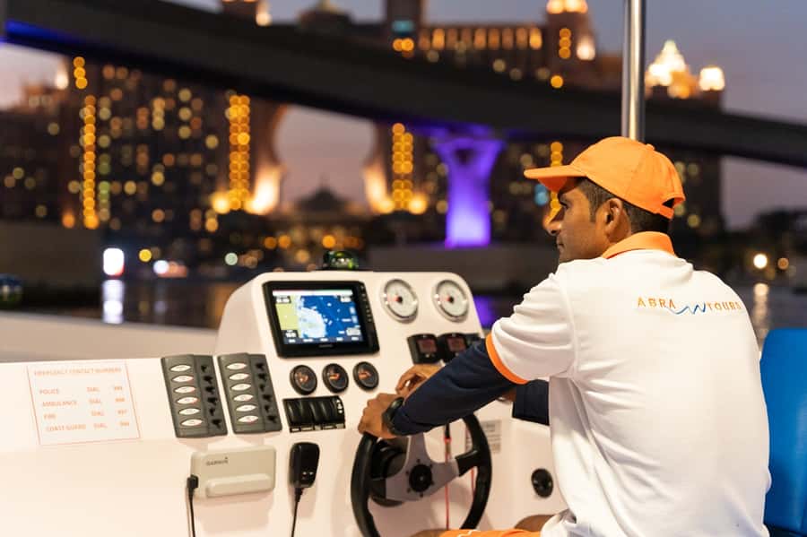Dubai: Abra Boat Tour in Atlantis, Palm, Ain Dubai & Marina - Jumeirah Beach Residence at sunset