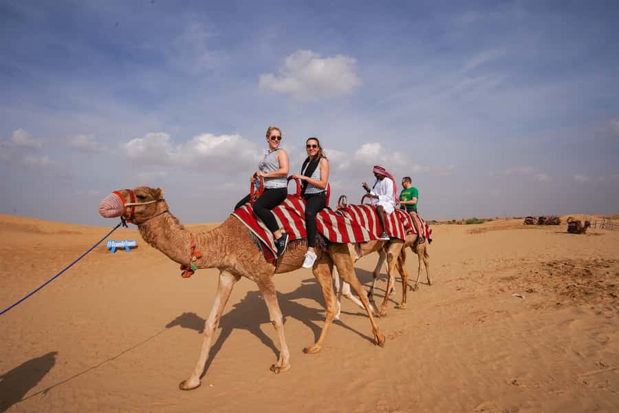 Dubai: Adventure Quad Bike Safari, Camel Ride & Refreshment - Getting ready for the quad bikes