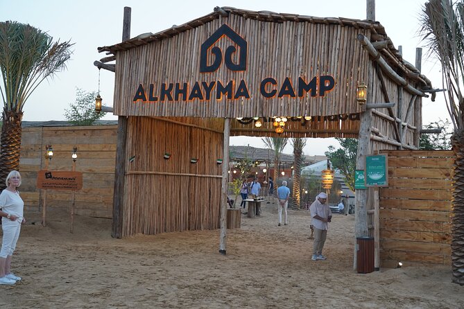Dubai Al Khayma Camp Experience with BBQ Dinner and Transfers - Camel feeding and the included camel ride