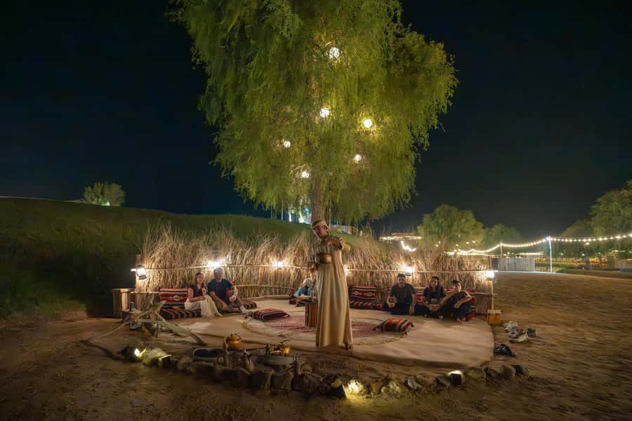 Dubai: Al Marmoom Oasis Camp Experience with Bedouin Dinner - Dinner with Ouzi, barbecue, and Luqaimat