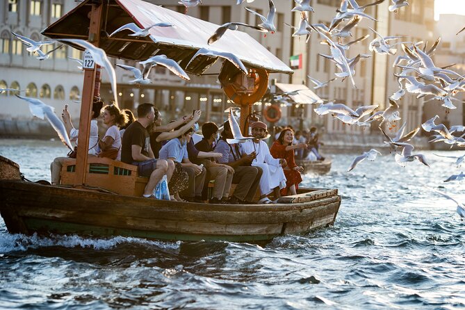 Dubai Aladdin Tour: Souks, Creek, Old Dubai and Tastings - Walking the creek and entering Al Fahidi