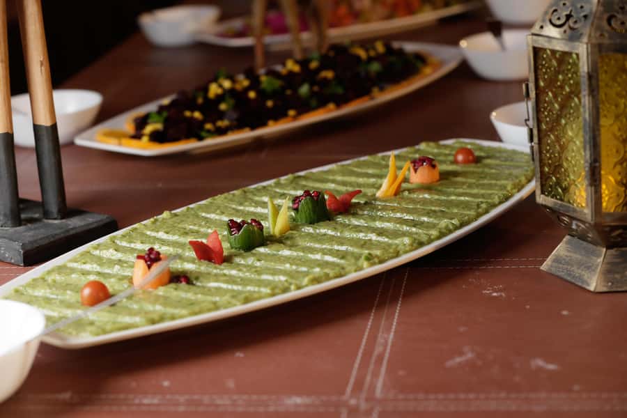 Dubai: Bedouin Camp, Dune Safari, Falcon Show & BBQ Dinner - Youla, Tanora, and belly dance performances