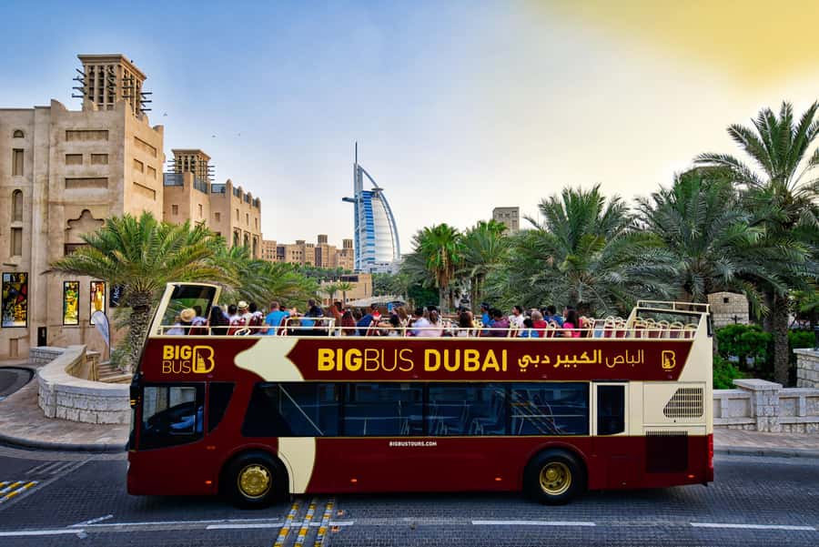 Dubai: Big Bus Panoramic Night Tour & Optional Dinner Cruise - Wind, noise, and choosing your seat
