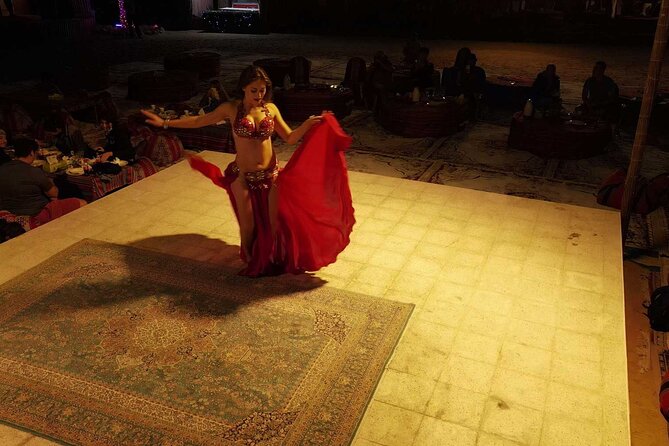 Dubai: Buggy Dune Bashing, Sand Boarding, Camel Ride & Show - BBQ dinner, belly dancing, and Tanoura performance