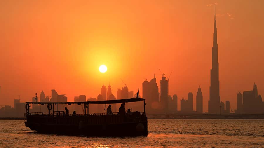 Dubai: Burj Khalifa Sunset on an Abra - Arabic music, commentary, and the mood on board