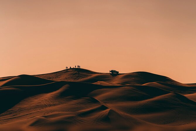 Dubai City Tour with Desert Safari, Camel Ride, Dune Bashing & BBQ - The camp after sunset