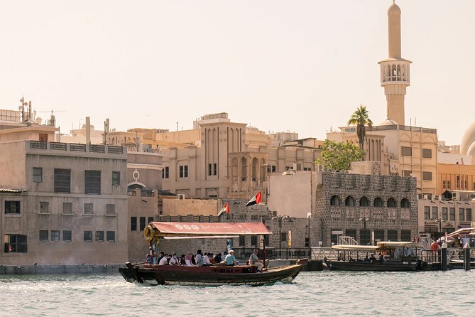 Dubai City Tour with Desert Safari, Camel Ride, Dune Bashing & BBQ - Dubai’s modern icons from the road