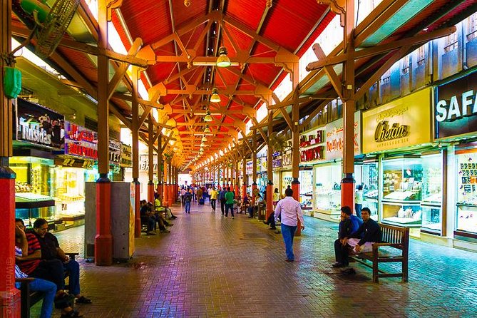 Dubai City Tour with Evening Desert Safari and BBQ Dinner-Combo - Sand boarding, falcons, and sunset photographs