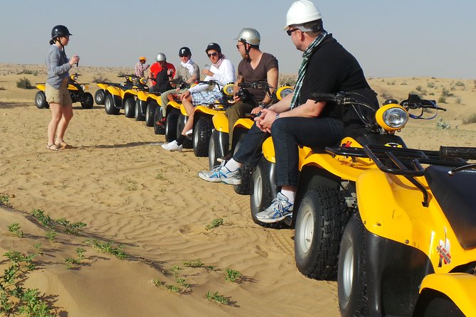 Dubai Desert Afternoon Quad Safari with Camel Ride, BBQ Dinner and Belly Dancing - A six-hour desert evening from central Dubai