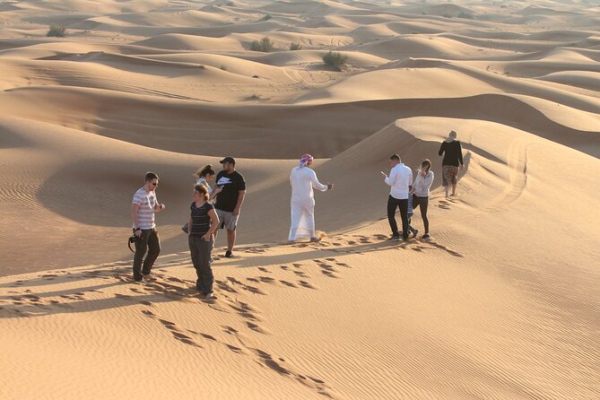 Dubai Desert Bespoke: Red Dunes Safari, Camel Ride & BBQ Options - Sunset views, sandboarding, and the short camel ride