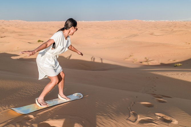 Dubai Desert Discovery: Red Dunes Safari, Sandboard & Camel Ride - Optional quad biking before the main ride