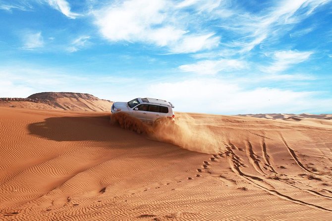 Dubai Desert Journey: Red Dunes Safari with BBQ in Bedouin Camp - Why Lahbab’s red dunes make this safari special