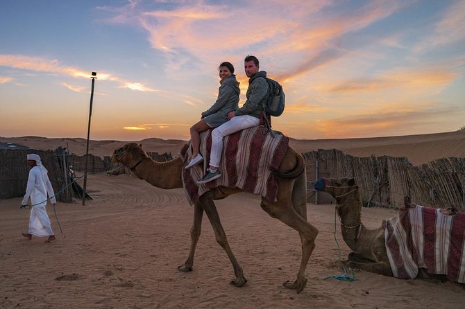 Dubai Desert Journey: Red Dunes Safari with BBQ in Bedouin Camp - Bedouin-style camp activities, from coffee to falcon photos