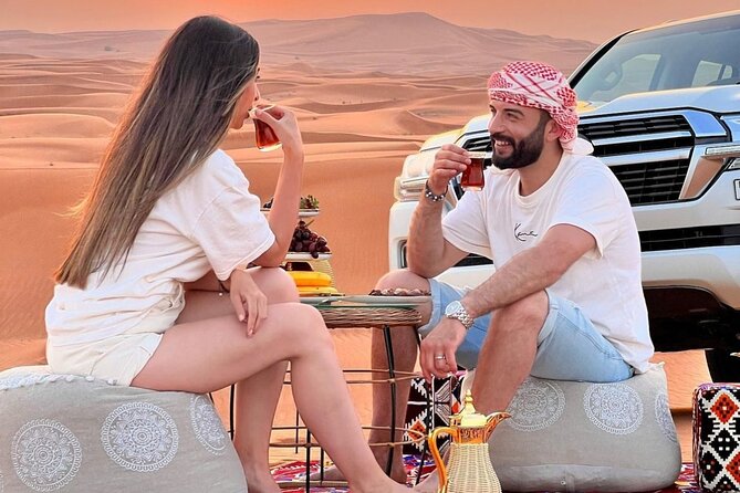 Dubai Desert Safari: 4x4 Dune Bashing, Camel Ride & BBQ Dinner - Camel riding and sandboarding