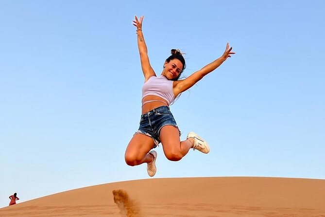 Dubai: Desert Safari 4x4 Dune with Camel Riding and Sandboarding - Sunset at the desert camp