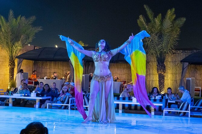 Dubai Desert Safari Adventure, Camel Ride, Sand surf, BBQ Dinner - Dune bashing, sandboarding, and the desert at sunset