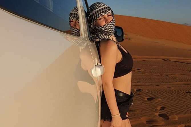 Dubai Desert Safari & Buffet Dinner and Camel ride with PRIVATE CAR - Sandboarding and the Sunset Photo Stop