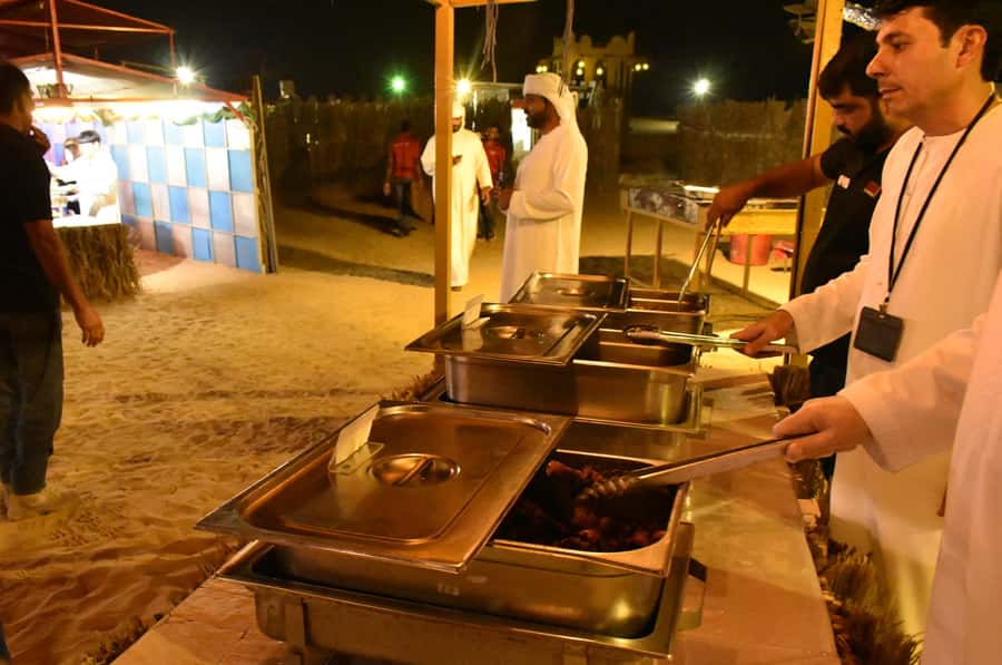 Dubai: Desert Safari, Camel Ride, and BBQ Dinner - The camp dinner, from Arabic dishes to soft drinks