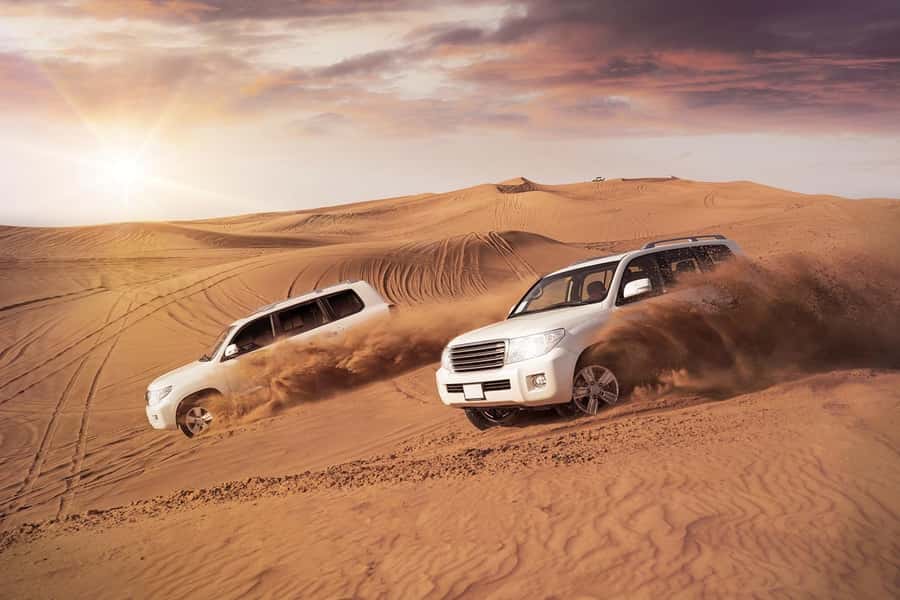 Dubai: Desert Safari, Camel Ride, and BBQ Dinner - The dune-bashing ride over rolling sand