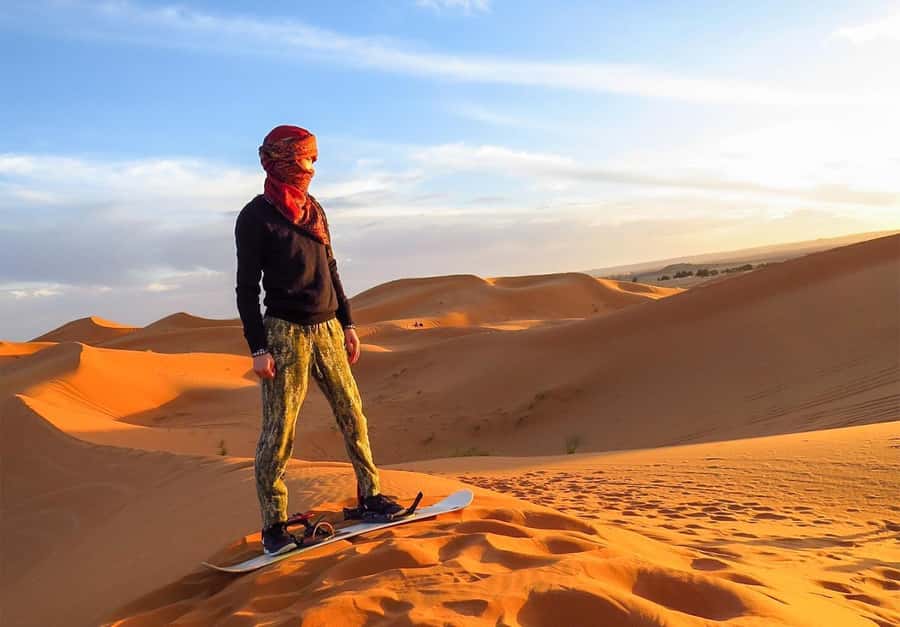 Dubai: Desert Safari, Camel Ride, Sandboard & Buffet Dinner - A short camel ride with time for photos