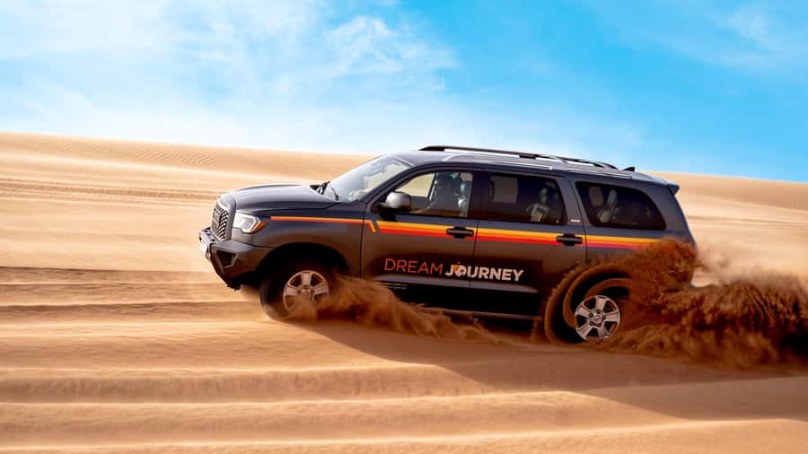 Dubai Desert Safari - Camel Ride, Sandboarding & 30 Min Quad - Pickup and the 50-minute ride to Lahbab