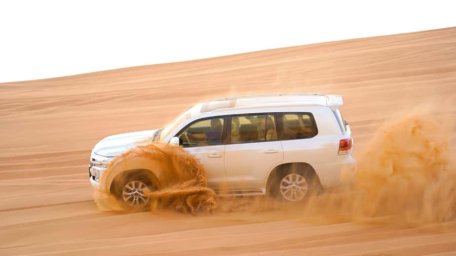 Dubai: Desert Safari, Camel Ride, Sandboarding, Quad Bike - Guides, driving, and the human side of the day
