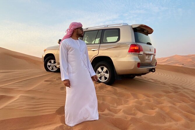 Dubai Desert Safari, Camel Ride, Shisha, Henna, Live BBQ & Shows - Sandboarding and the desert photo stop