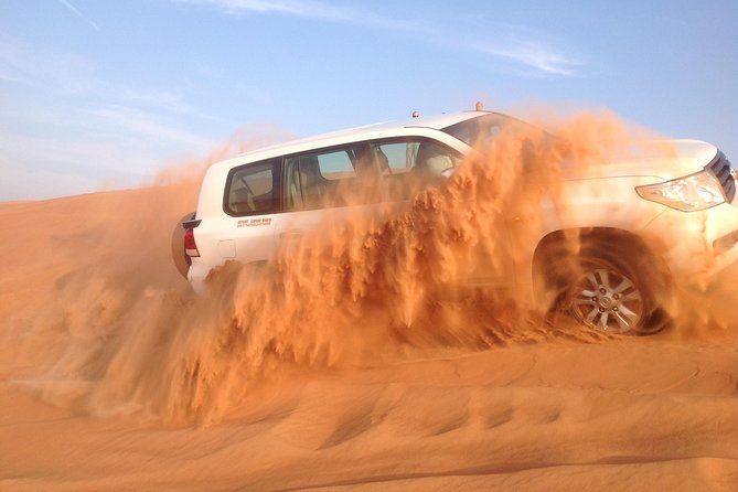 Dubai: Desert Safari, Camel Ride, Show & Optional Dinner - BBQ dinner, tea, and the live shows