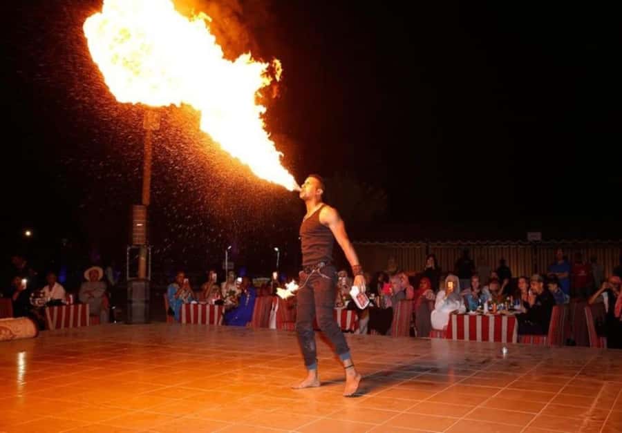 Dubai: Desert Safari Camel Riding, Sandboarding & BBQ Dinner - Sandboarding and desert photographs