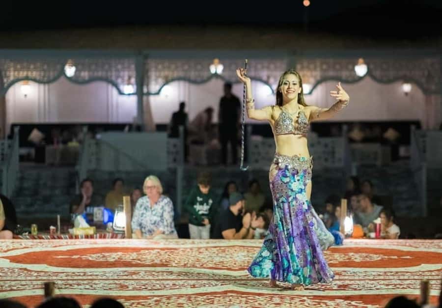 Dubai: Desert Safari Camel Riding, Sandboarding & BBQ Dinner - A short camel ride at sunset
