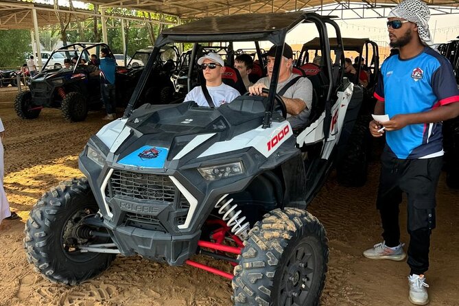 Dubai Desert Safari Dune Bashing, Camel Ride, Sandboarding & BBQ - BBQ dinner, drinks, and three shows