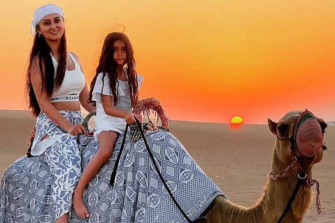 Dubai Desert Safari: Dune Drive Camel & 5<em> BBQ Shows Stargazing – Key points at a glance’ /></p>
<ul>
<li><strong>Red dunes near Lahbab:</strong> The 15-minute dune-bashing drive is the main burst of action, followed by a photo stop at sunset.</li>
<li><strong>Shared Land Cruiser transport:</strong> Pickup and drop-off are included, with a maximum of six people in each vehicle.</li>
<li><strong>More than a camel ride:</strong> You can also try sandboarding, henna painting, Arabic costumes, and camp refreshments.</li>
<li><strong>Dinner with three shows:</strong> The evening includes a barbecue buffet, belly dance, Tanoura dance, and a fire performance.</li>
<li><strong>Optional add-ons:</strong> Quad bikes, dune buggies, longer camel rides, horse riding, and falcon activities cost extra.</li>
<li><strong>Good value at $49:</strong> The base price covers transport, food, drinks, desert activities, and entertainment, but not premium seating or motorized rides.</li>
</ul>
<h2>From Dubai streets to Lahbab’s red dunes</h2>
<p><img width="669" height="446" decoding="async" src=